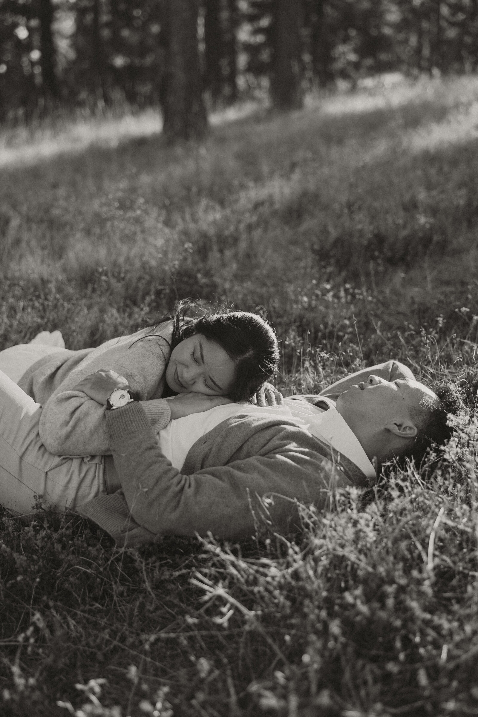 mount laguna session, girl laying on boy's chest, engagement session