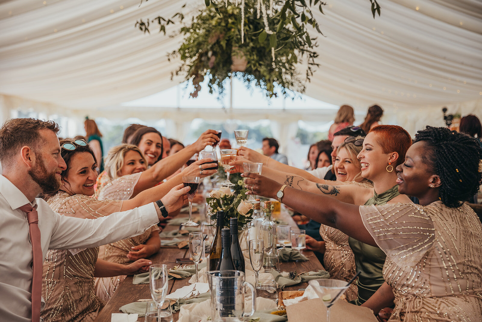 wedding guests cheers each other