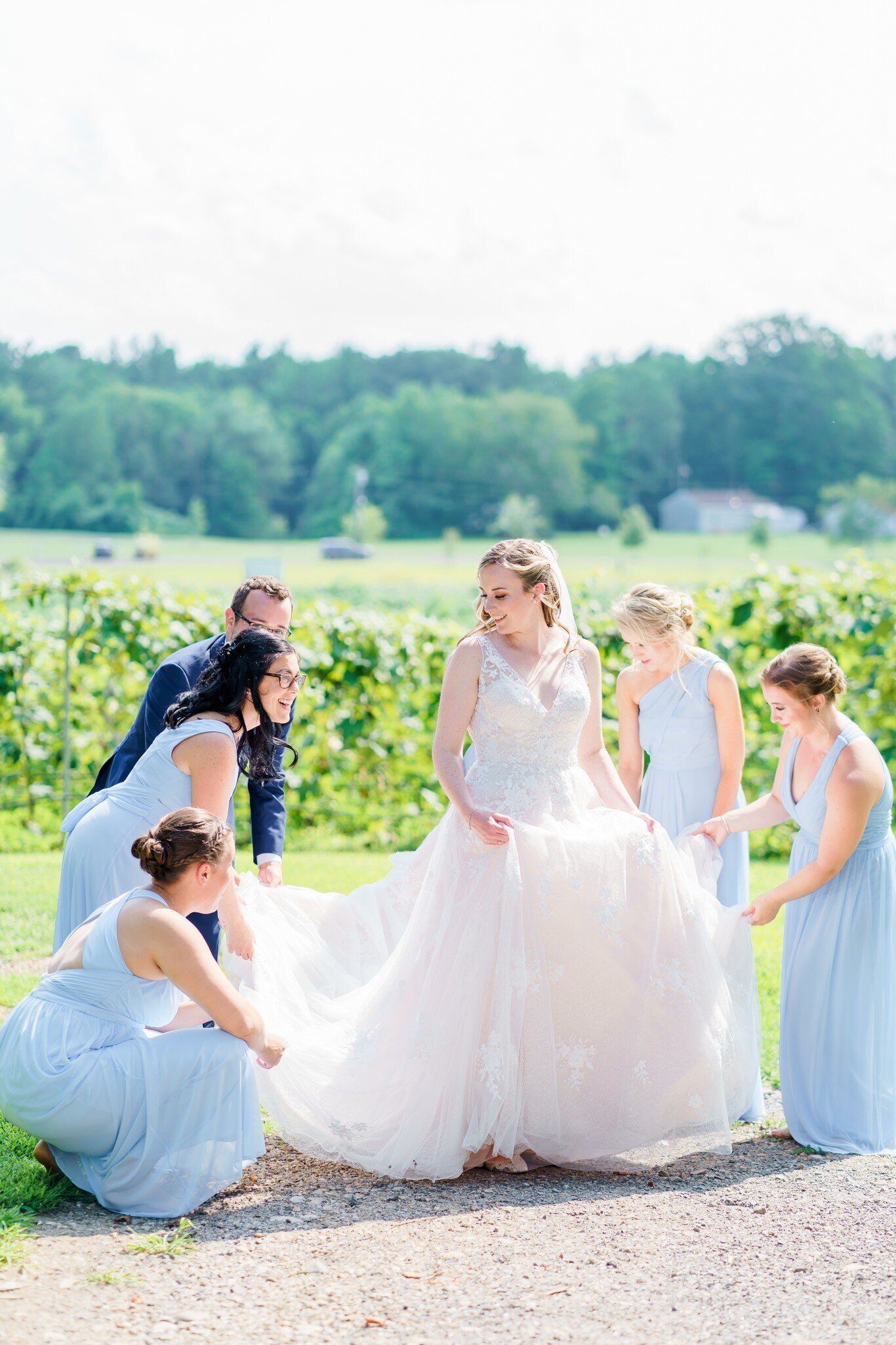 Bride getting ready with bridal party before ceremony