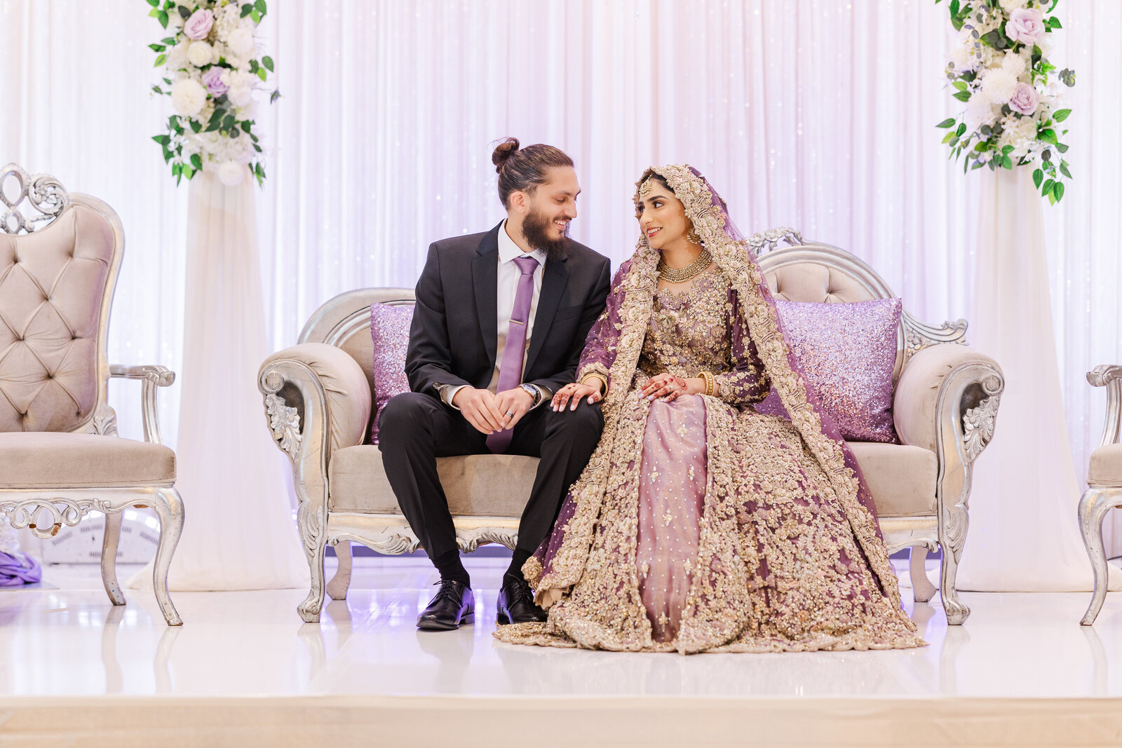 Bride-and-groom-talking-on-the-stage