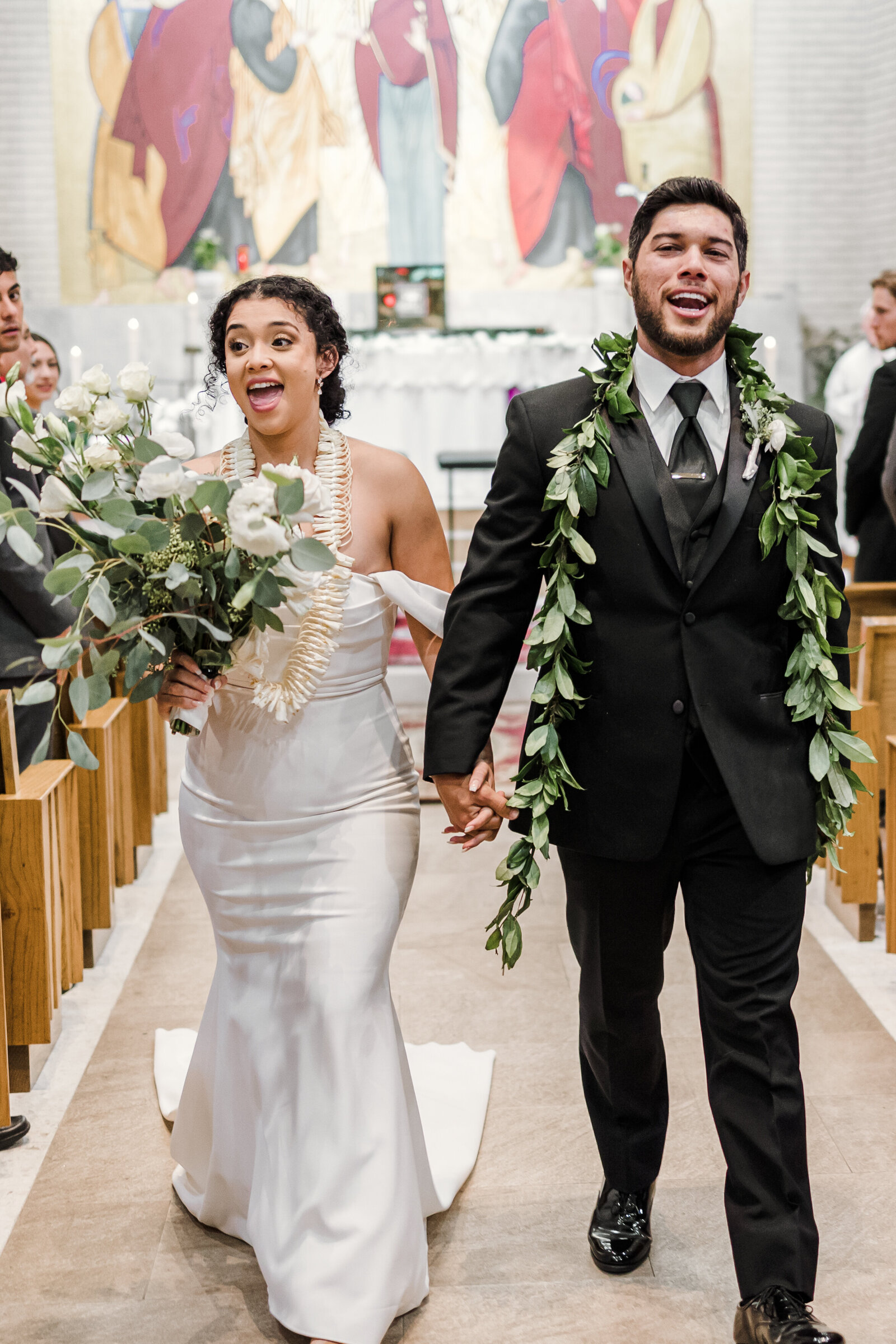 Newly Weds celebrate on their way out of Saint Mary's Catholic Church in Fullerton California