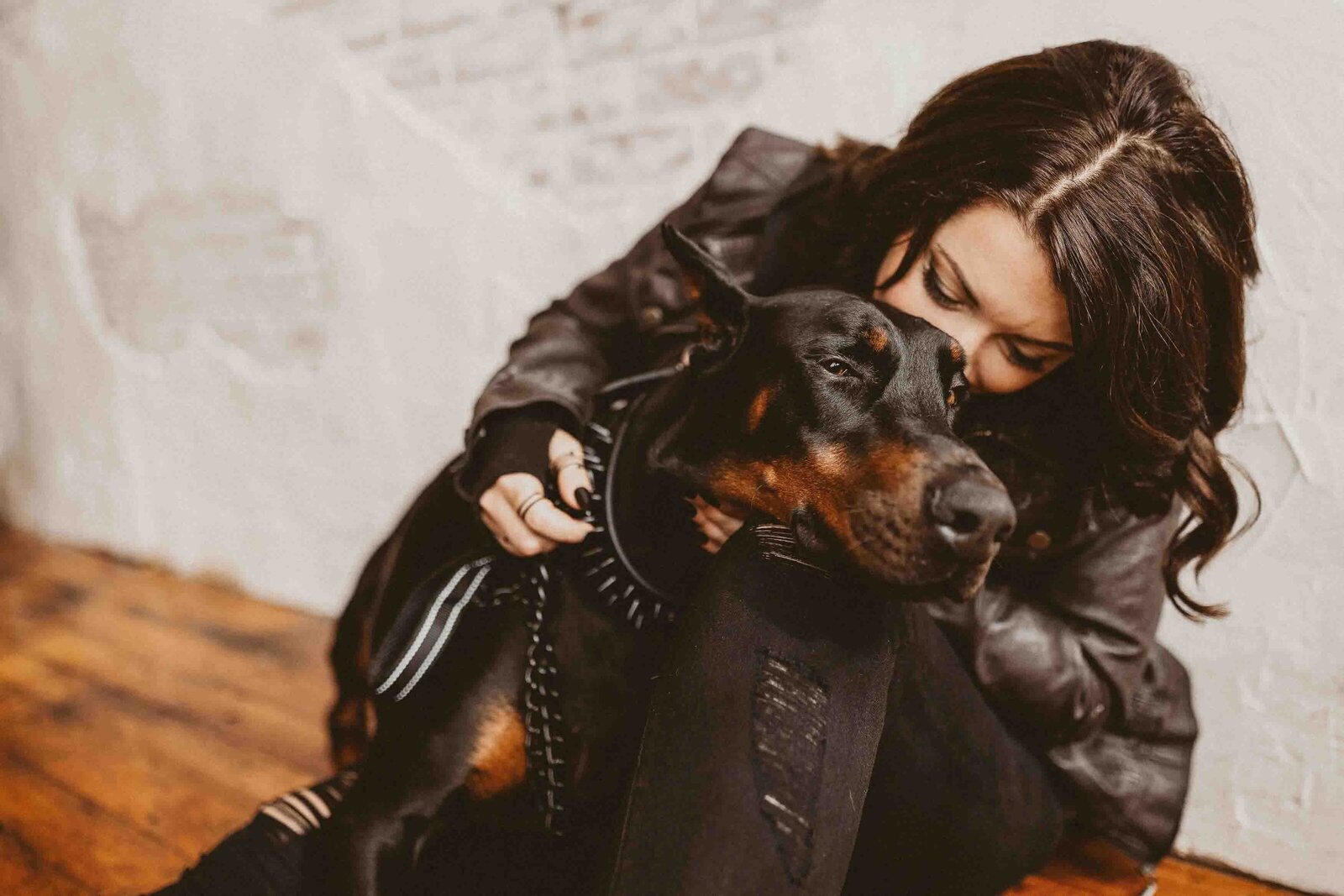 woman hugging her pet dog