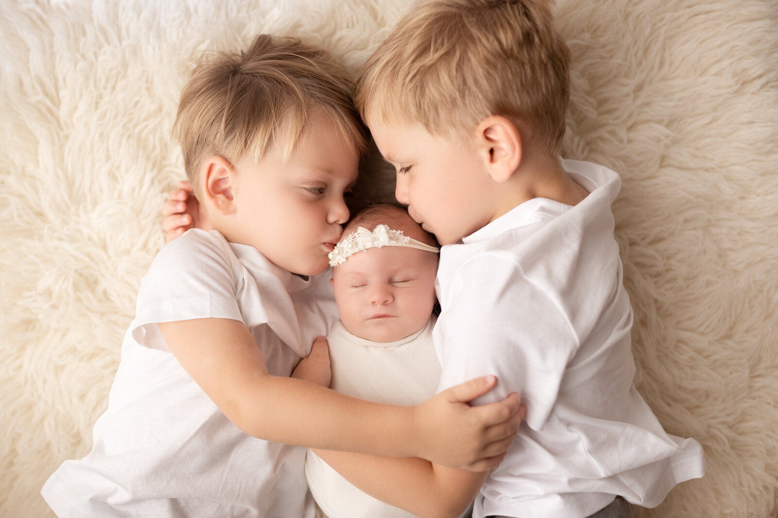 siblings during lifestyle newborn session near Birmingham