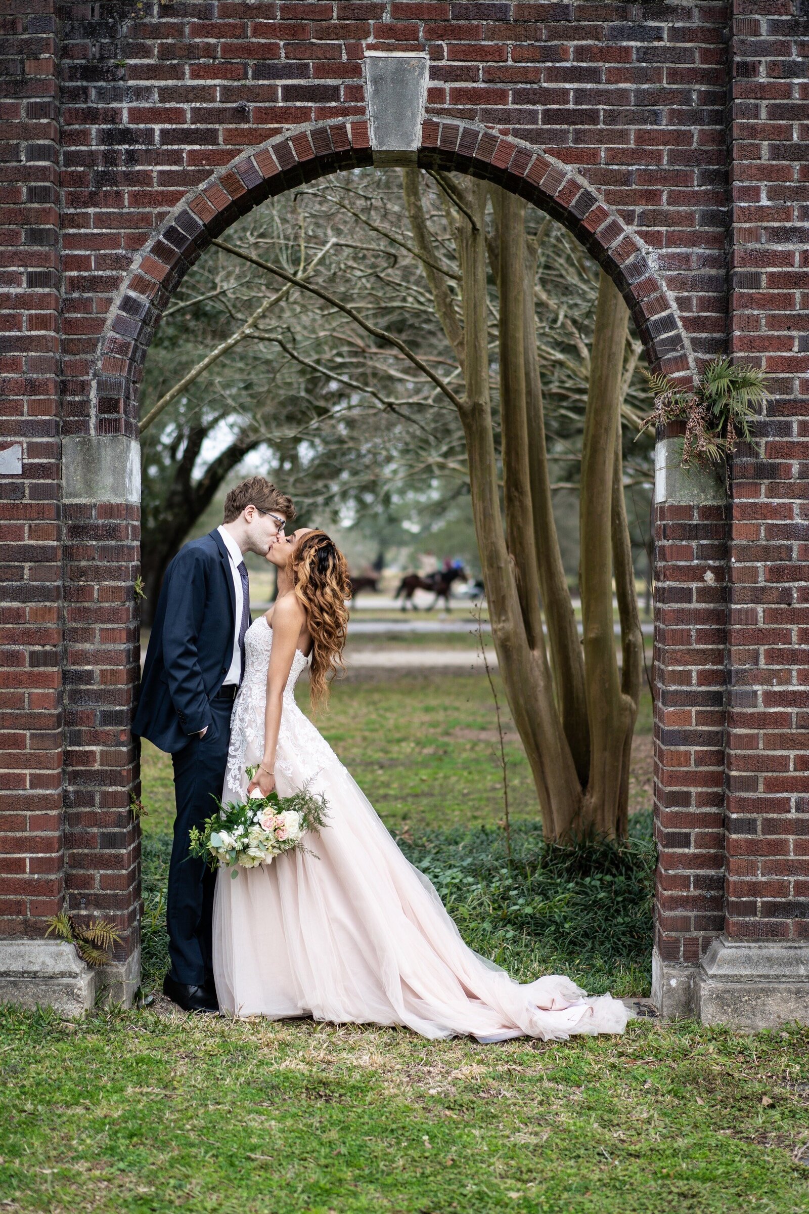 Portrait of bride and groom at Audubon Park in New Orleans