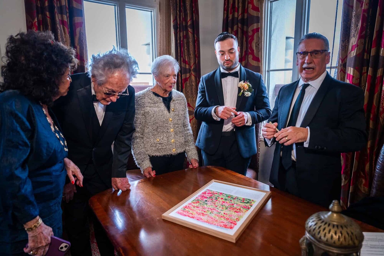 signing of the Ketubah at jewish wedding - Casa Monica Wedding venue in St Augustine