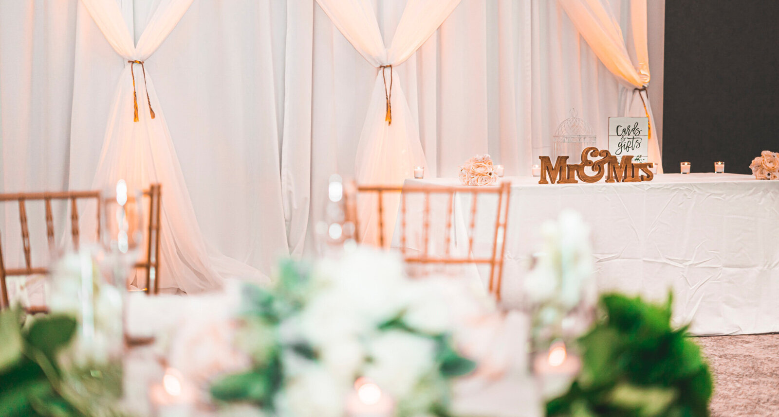 Wedding reception tables with elegant drapings