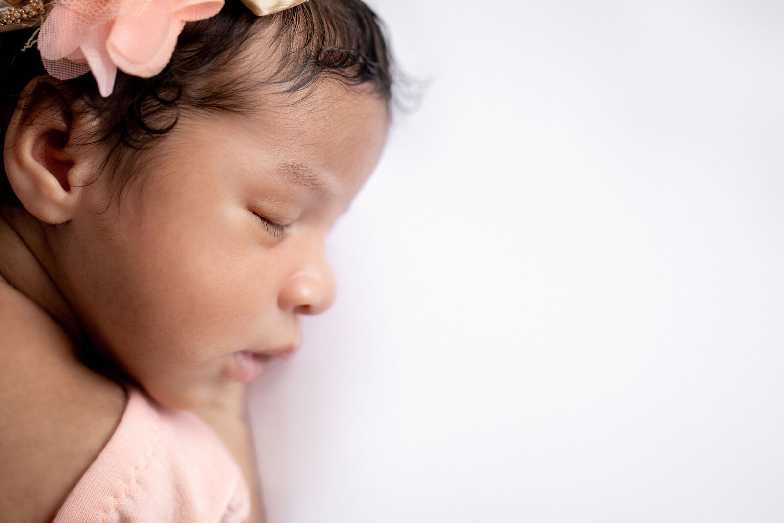 the profile of a sleeping newborn in the Philadelphia Newborn Portrait Studio by Ivory Tree