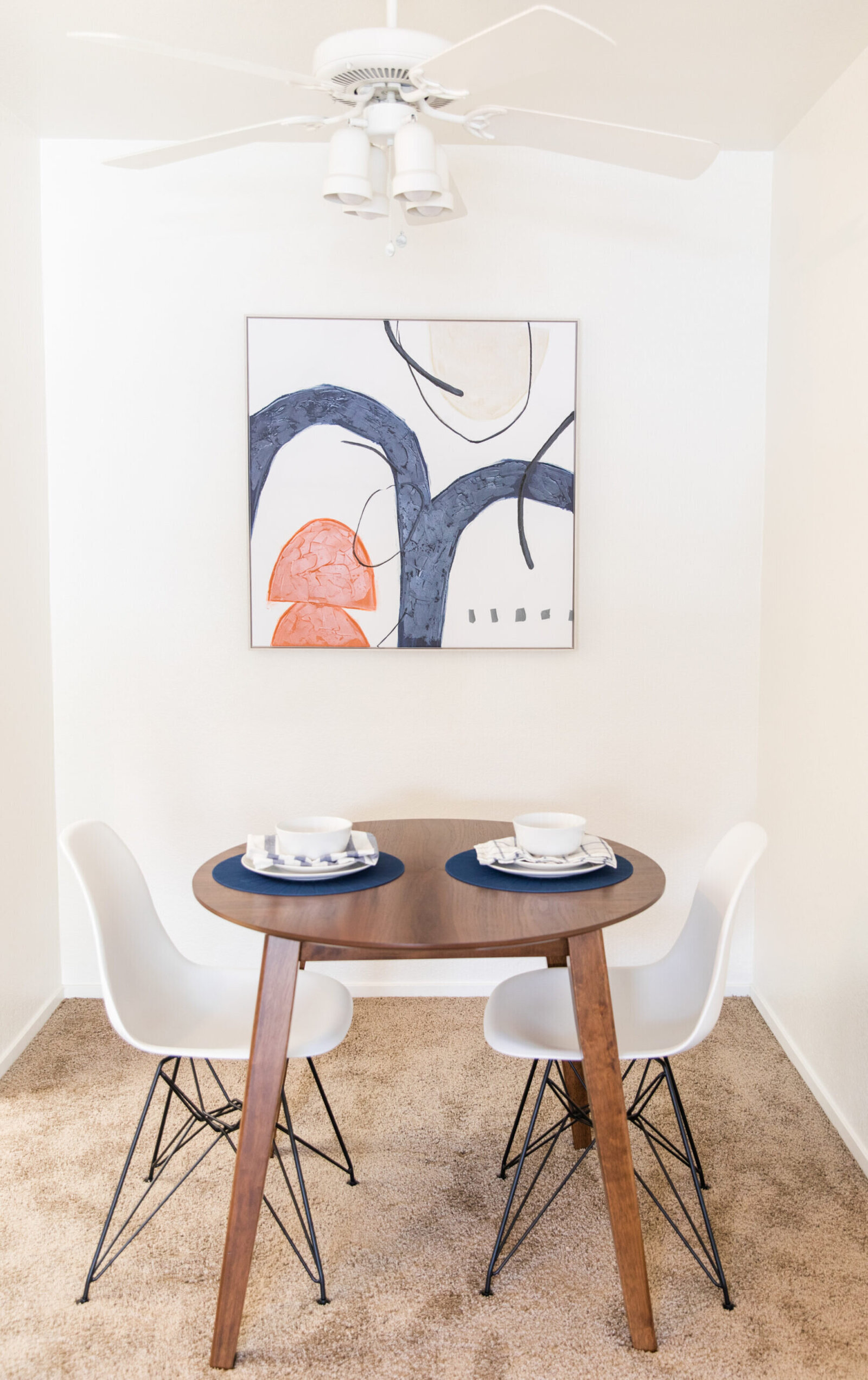 Small dining area with a table and chairs