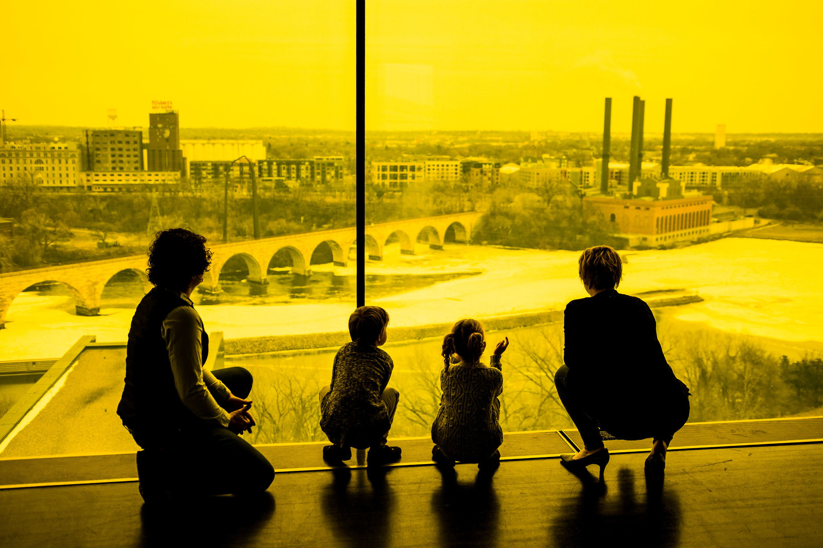 LGBT family looking at Minneapolis skyline