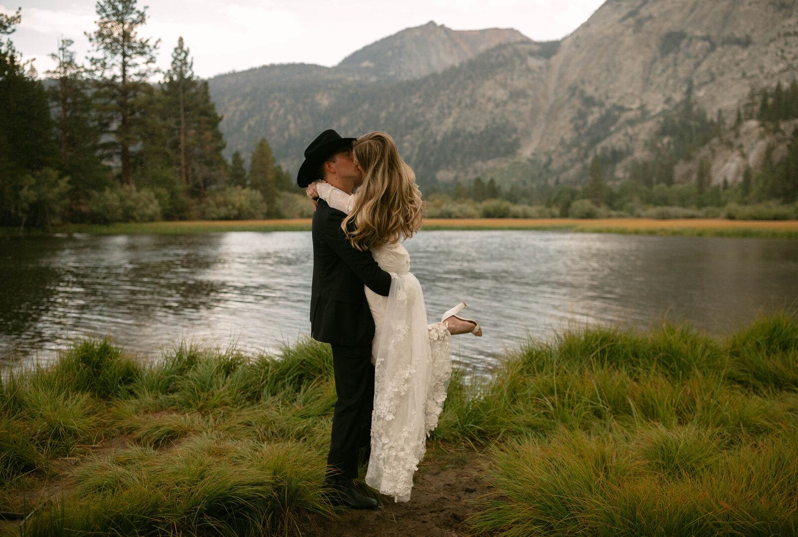 bride and groom in the mountains on wedding day
