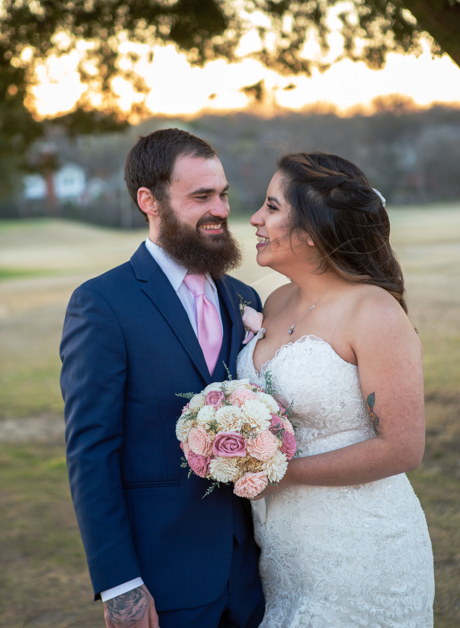 couple smiling at sunset