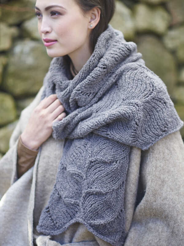 atural makeup for a model in a grey shawl