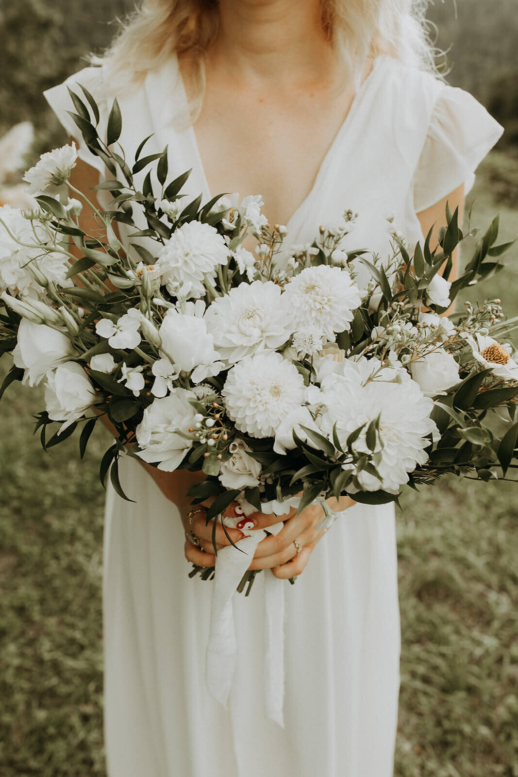large white and greenery bridal bouquet