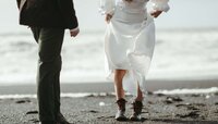 Beach-Wedding-Couple-Walking-On-Sand
