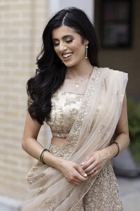 fallback shared on Invalid Date | a bride wearing traditional Indian wedding attire