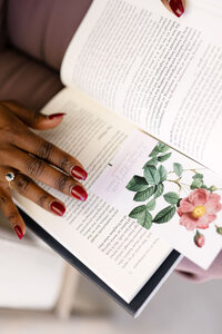 Floral bookmark in book