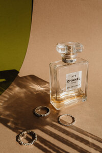kaboompics_refined-aromas-perfume-bottles-cast-in-shadows-and-light-35440