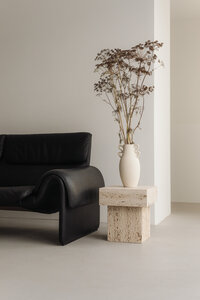 kaboompics_interior-inspo-warm-minimalist-living-room-de-sede-ds-2011-leather-sofa-and-travertine-furniture-36559