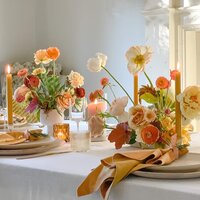 bright wedding flowers on reception table