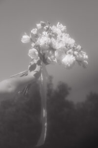 bouquet being held high in the air