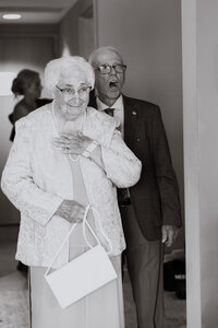 candid moment grandparents seeing bride first time at wedding