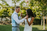 bride and groom dancing outside