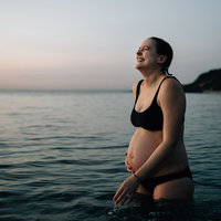 pregnant in bikini at half moon beach melbourne maternity photographer