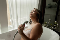 indoor luxury wedding venue with moody lighting and candles on film 