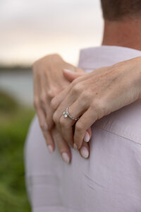Maui Family Photographers capture woman's hands wrapped around husband