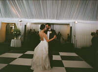 bride and groom in cowboy hats