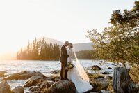 Couple posing in front of Lake Wenatchee near Leavenworth at sunset!