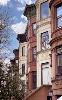 Residential street with brownstone houses in Brooklyn, New York