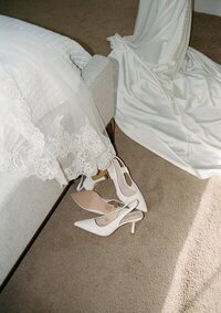 east coast wedding photography of bride's dress and shoes taken by Shelby Ann Photos