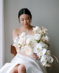 All white bridal orchids planned by Bianca Nichole and Co