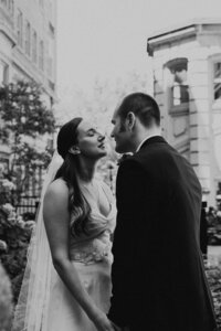 bride and groom staring into each other's eyes