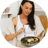 Women in the kitchen eating a nutritious lunch