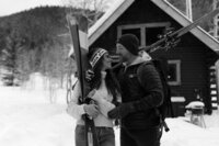 couple pose for colorado ski photo in black and white