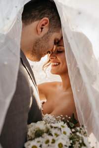 Couple under veil