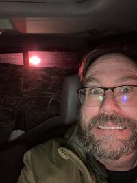 a selfie of Michael Bennett in his vehicle