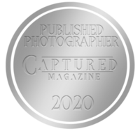 Captured Magazine Badge