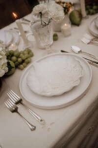 bride and groom by flowers