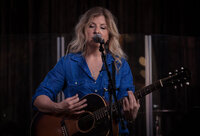 Amy Hailstone performing on stage.
