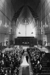 Black and white image of large wedding in a Chapel | Sush Digital Media