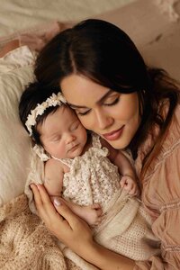 Miami photographer captures tender moment between parents and daughters in a studio setting