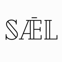 Minimal black text logo reading "SAEL" in a thin serif font with a macron accent over the "A" on a white background.