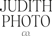 Black version of the Judith Photo Co. logo.