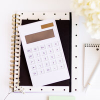 Desk with  white calculator