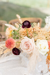 Floral arrangement sitting on table