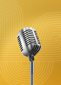 A 1950s-looking microphone on top of a geometric pattern in a mid-century modern style