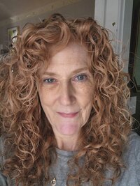 Before professional hair and makeup for a mature delaware boudoir photoshoot